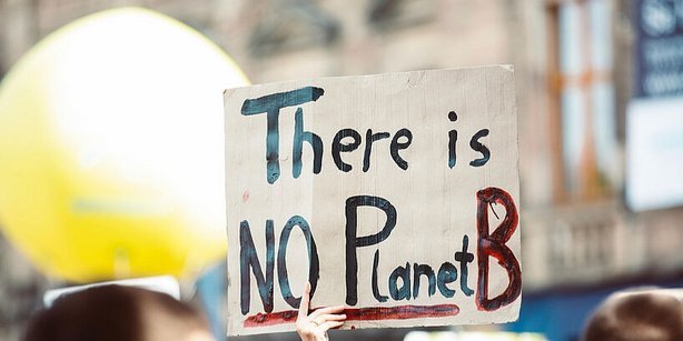 Plakat mit NoPLanetB