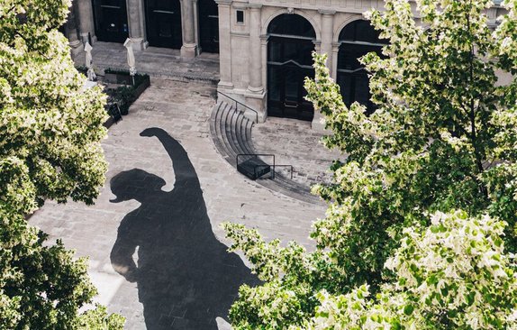 The Arcaded Courtyard of the University of Vienna, with the shadow of Castalia from Greek mythology.